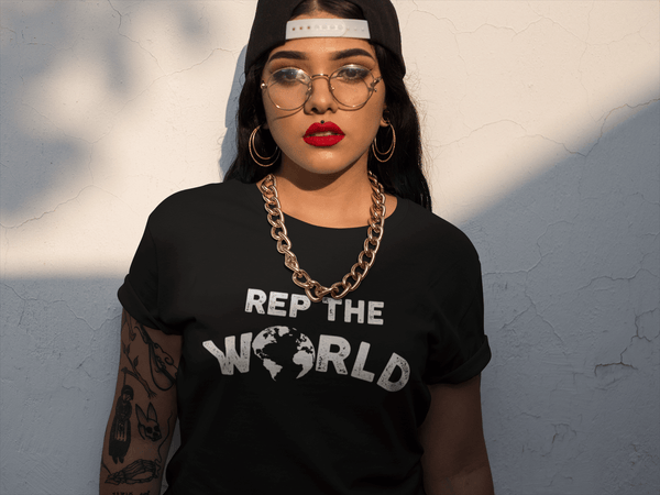 Hispanic Lady wearing black Bella + Canvas T-Shirt  from Xpert apparel Store 