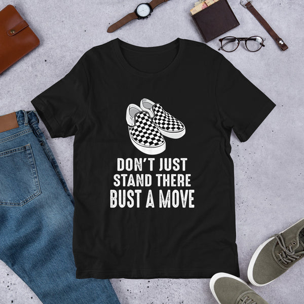 Flat Lay mock up of black T-shirt with "Don't just stand there bust a move design from the Xpert apparel store