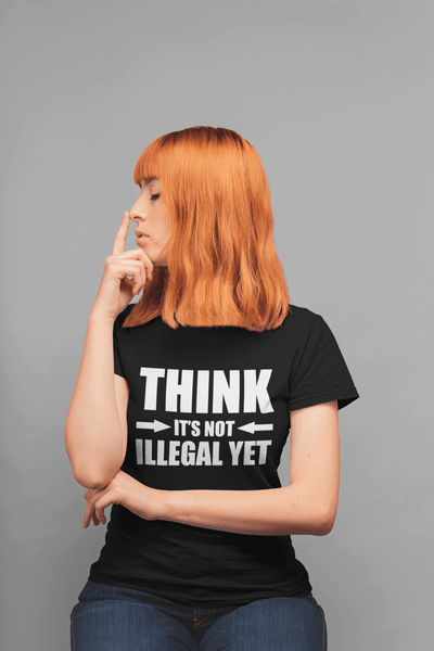 Lady doing the Thinking Man pose, in black t-shirt with a sarcastic design "Think It's not Illegal Yet" design available from the Xpert Apparel Store 