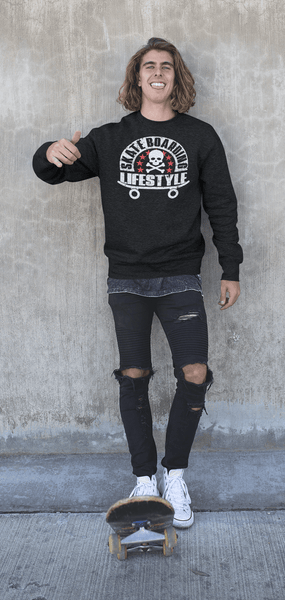 Guy standing on his skateboard wearing black t-shirt/Sweater and ripped skinny jeans with "Skateboarding Lifestyle" design on the front available from the Xpert Apparel Store.