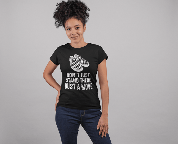 Young Lady standing with gray background wearing a Don't just stand there bust a move design from the Xpert apparel store 