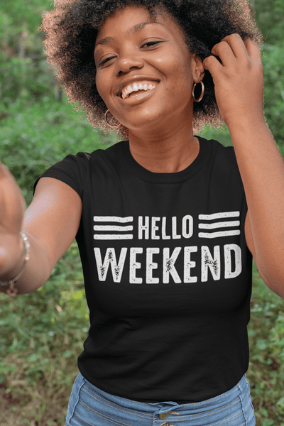 African American female smiling and posing in Black t-shirt with Hello Weekend printed in white