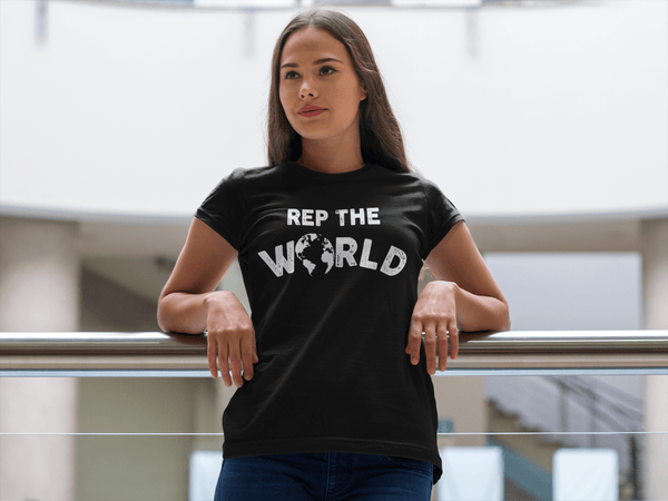 Young lady standing in Mall wearing a Rep The World T-shirt from the Xpert Apparel Store 