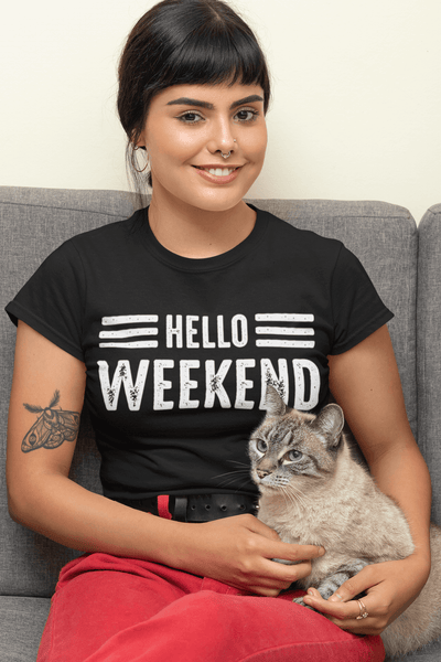Lady sitting with Cat in her lap wearing a Hello Weekend T-shirt